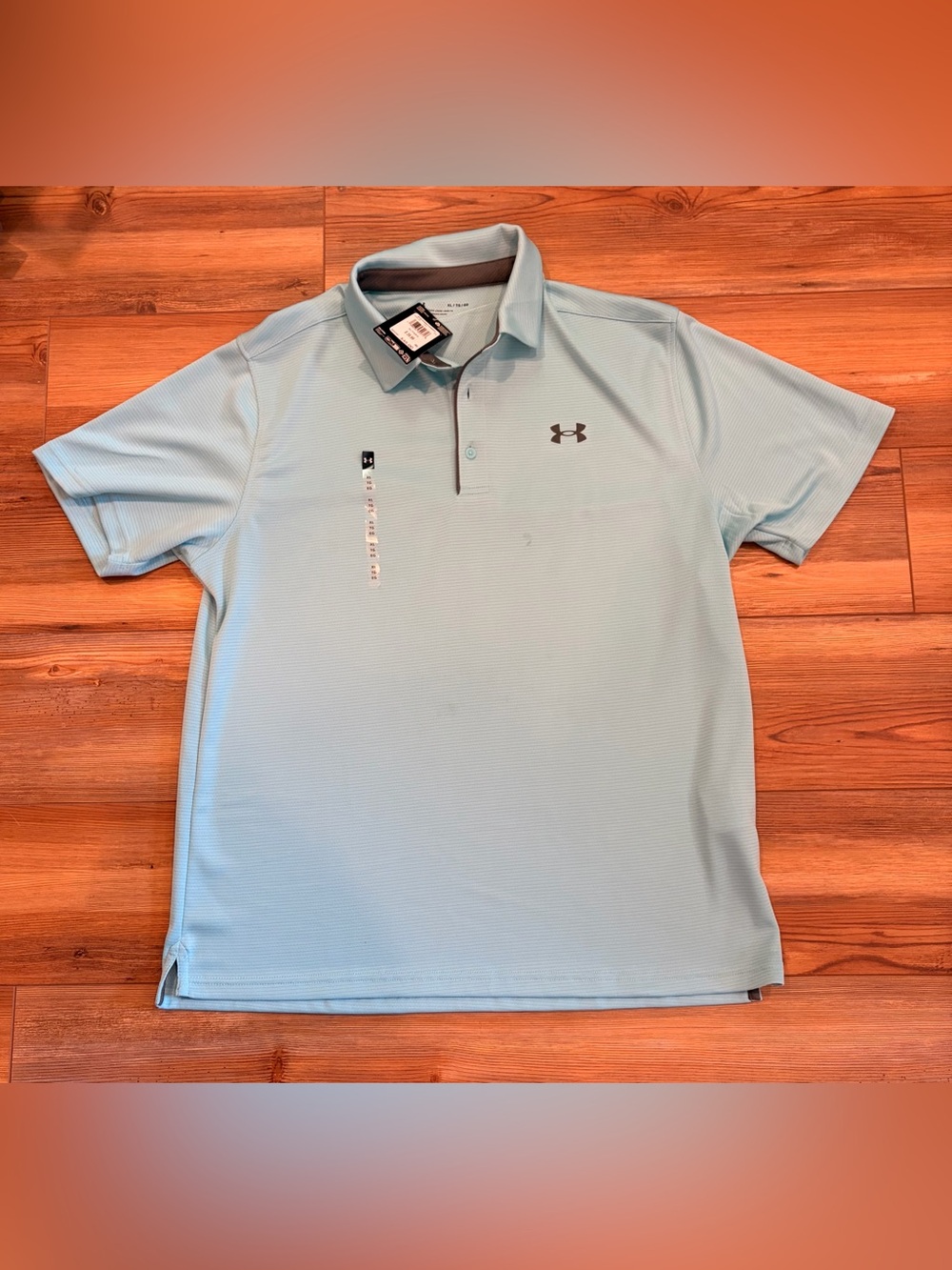 Under Armour Men’s Polo in Pale Blue with Chest Logo